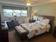 Main bedroom with a queen bed, and ensuite laundry at 2263 Americus E Blvd # 59, Clearwater, FL 33763