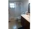 Bathroom with a tub, shower, and vanity at 2408 Chilk Ave, Sarasota, FL 34234