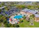 Aerial view of community pool and clubhouse at 2416 Kensington Greens Dr # 2416, Sun City Center, FL 33573