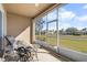 Relaxing screened porch overlooking a lush golf course at 2416 Kensington Greens Dr # 2416, Sun City Center, FL 33573