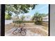 Backyard with grassy area and two bicycles at 2418 2Nd S Ave, St Petersburg, FL 33712