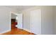 Bedroom with hardwood floors and access to other rooms at 2418 2Nd S Ave, St Petersburg, FL 33712