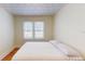 Spacious bedroom with hardwood floors and large windows at 2418 2Nd S Ave, St Petersburg, FL 33712