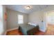 Bedroom with hardwood floors and window at 2418 2Nd S Ave, St Petersburg, FL 33712