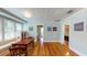 Living room with hardwood floors, fireplace, and built-in shelving at 2418 2Nd S Ave, St Petersburg, FL 33712