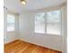 Bright sunroom with hardwood floors and large windows at 2418 2Nd S Ave, St Petersburg, FL 33712