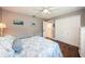 Serene bedroom with hardwood floors, and direct access to a private bathroom at 2973 Somersworth Dr, Clearwater, FL 33761