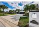 Home's exterior showcasing curb appeal and driveway at 2973 Somersworth Dr, Clearwater, FL 33761