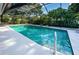 Inviting screened pool with spacious deck at 2973 Somersworth Dr, Clearwater, FL 33761