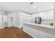 Modern kitchen featuring stainless steel appliances, white cabinets, and quartz countertops at 31806 Larkenheath Dr, Wesley Chapel, FL 33543