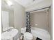 Clean bathroom with shower/tub combo, toilet and vanity at 3405 W Swann Ave # 6, Tampa, FL 33609