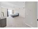 Spacious bedroom with large windows and a king-size bed at 3405 W Swann Ave # 6, Tampa, FL 33609