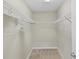 Walk-in closet with wire shelving, providing ample storage at 3405 W Swann Ave # 6, Tampa, FL 33609