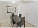 Dining area with table and chairs near laundry closet at 3405 W Swann Ave # 6, Tampa, FL 33609