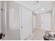 Interior hallway with access to other rooms and tiled floors at 3405 W Swann Ave # 6, Tampa, FL 33609