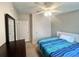 Bedroom with a bed, a closet, carpet flooring, and a dresser at 37544 Corey Lewis Ave, Zephyrhills, FL 33541