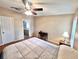 Cozy bedroom with natural light, a ceiling fan, and wood flooring at 37544 Corey Lewis Ave, Zephyrhills, FL 33541