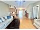Open concept living area with a view into the kitchen and dining area at 37544 Corey Lewis Ave, Zephyrhills, FL 33541