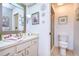 Bathroom boasts a vanity with under-sink storage and an enclosed shower at 38351 Ironwood Pl, Zephyrhills, FL 33542