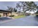 Exterior view of building, parking area, and landscaping at 38351 Ironwood Pl, Zephyrhills, FL 33542