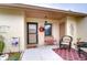 Patio with seating area and autumnal decor at 38351 Ironwood Pl, Zephyrhills, FL 33542