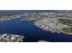 Aerial view of waterfront community with many houses at 404 Manns Harbor Dr, Apollo Beach, FL 33572