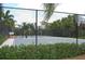 Outdoor basketball court with two hoops at 404 Manns Harbor Dr, Apollo Beach, FL 33572