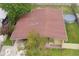 Aerial view of house showing roof and yard at 4513 W Clifton St, Tampa, FL 33614