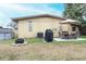 Backyard features a patio, grill and fire pit at 4513 W Clifton St, Tampa, FL 33614