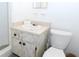 Small bathroom with white toilet and vanity at 4513 W Clifton St, Tampa, FL 33614