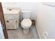 Simple bathroom with toilet and vanity at 4513 W Clifton St, Tampa, FL 33614