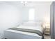 Bright bedroom with a king-size bed and light decor at 4513 W Clifton St, Tampa, FL 33614