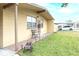 House exterior featuring a patio and landscaping at 4513 W Clifton St, Tampa, FL 33614