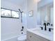 Modern bathroom with white subway tile and updated vanity at 4804 Foxshire Cir, Tampa, FL 33624