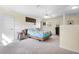 Upstairs bedroom with carpeted floor and ceiling fan at 5507 Darlene St, Spring Hill, FL 34607