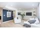 Bright and airy living room with white furniture and a stylish rug at 6411 Monterey Blvd, Tampa, FL 33625