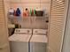 Laundry closet with washer and dryer at 6428 Remus Dr, New Port Richey, FL 34653