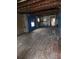 Unfinished room with exposed wooden beams at 6502 S Himes Ave, Tampa, FL 33611