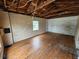 Unfinished room with hardwood floors at 6502 S Himes Ave, Tampa, FL 33611