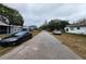 Residential street with houses and parked cars at 6502 S Himes Ave, Tampa, FL 33611