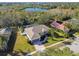 Single story home with pool and a large backyard at 714 Hidden Lake Dr, Tarpon Springs, FL 34689