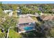 Aerial view of home showcasing pool and backyard at 714 Hidden Lake Dr, Tarpon Springs, FL 34689