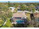 Aerial view of home showcasing pool and backyard at 714 Hidden Lake Dr, Tarpon Springs, FL 34689