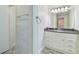 Clean bathroom with granite countertop and white cabinets at 731 74Th N St, St Petersburg, FL 33710