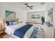 Main bedroom with ocean-themed decor and ample natural light at 731 74Th N St, St Petersburg, FL 33710