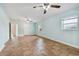 Spacious bedroom with tile floors and ceiling fan at 731 74Th N St, St Petersburg, FL 33710