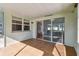 Bright Florida room with tile floors and sliding doors at 731 74Th N St, St Petersburg, FL 33710