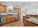 Modern kitchen featuring stainless steel appliances and granite countertops at 731 74Th N St, St Petersburg, FL 33710