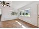 Bright living room with large windows and tile flooring at 731 74Th N St, St Petersburg, FL 33710