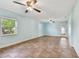 Bright living room featuring tile floors and sliding doors at 731 74Th N St, St Petersburg, FL 33710